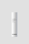 Maginista Body Bardot Thickening Lotion i en hvit flaske mot lys grå bakgrunn