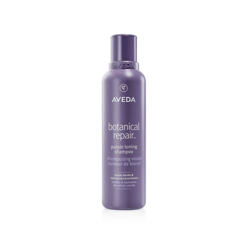Aveda Botanical Repair Purple Toning Shampoo i en lilla flaske mot hvit bakgrunn