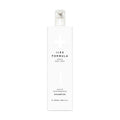Iles Formula Haute Performance Shampoo 1000ml i en stor hvit pumpeflaske mot hvit bakgrunn