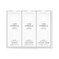 Iles Formula Signature Collection med shampoo, conditioner og finishing serum i hvite esker mot hvit bakgrunn